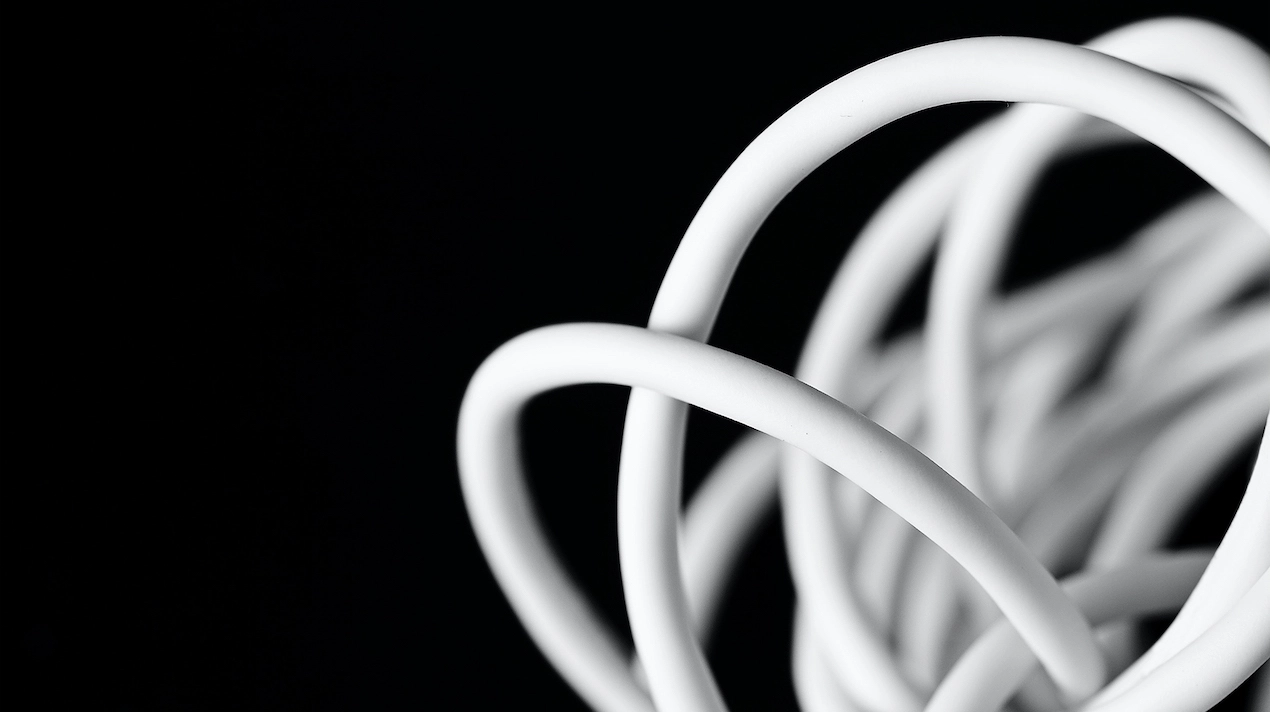 a close-up of a white flexible wire