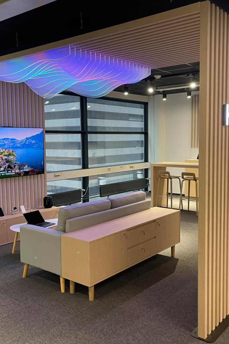 unique installations and frunitures in Huawei's showroom with illuminated signage